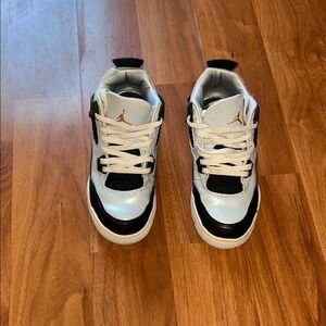 Jordan Kids Sneakers in Black, White, and Gold